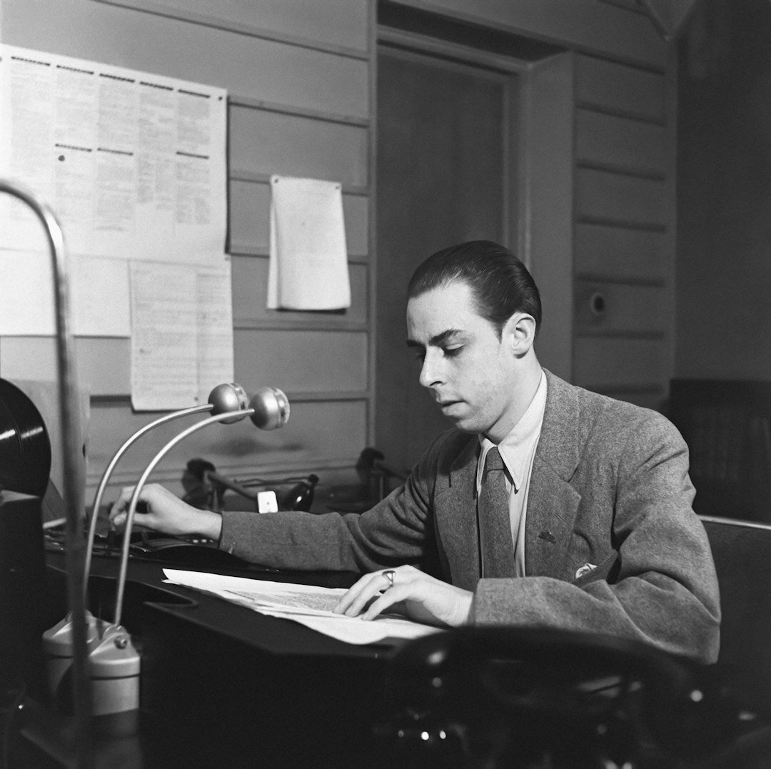 Field coordinator using a two-way radio on a reporting assignment